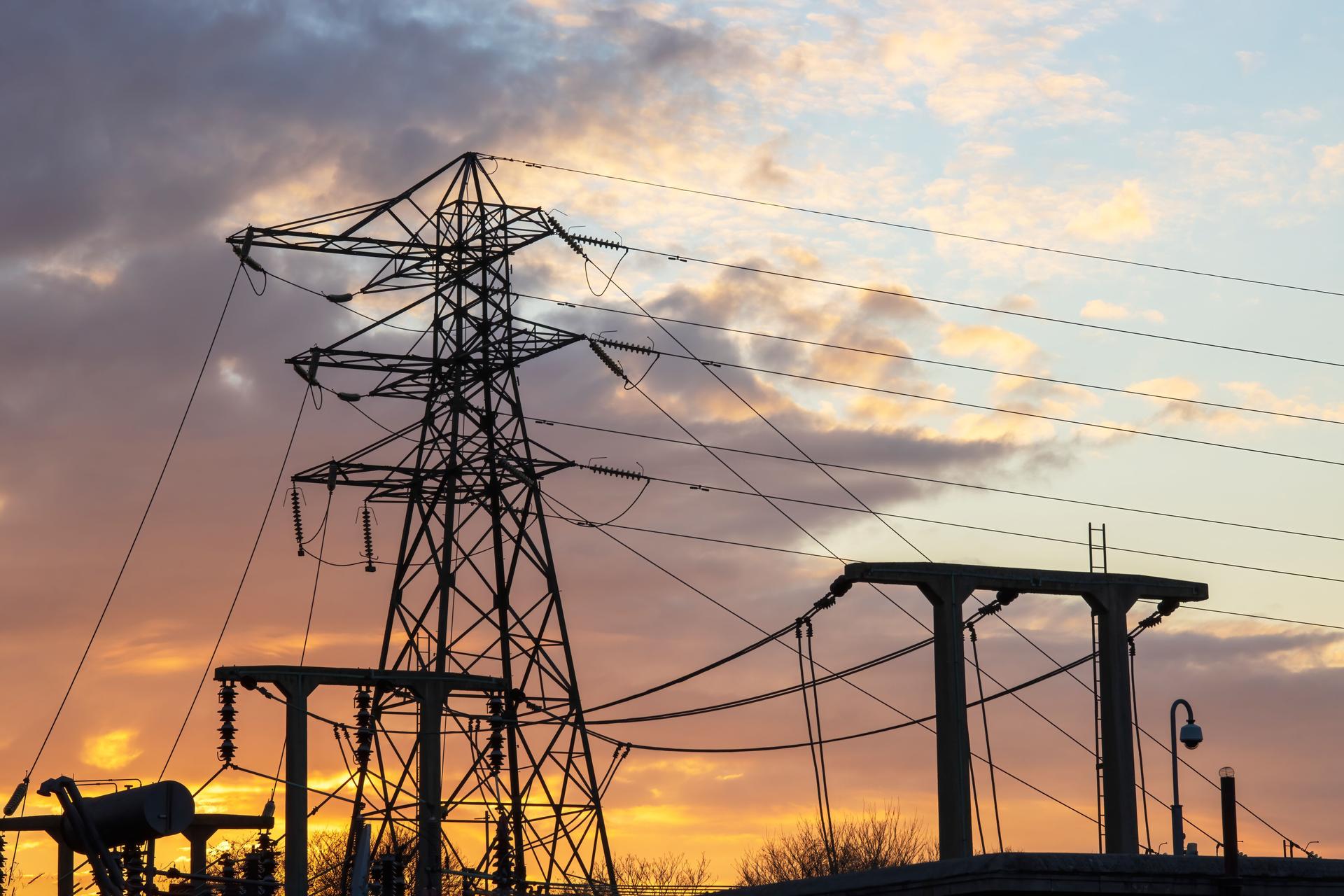silhouette-of-pylon-and-substation-against-a-warm-2026-03-18-16-20-26-utc.jpg